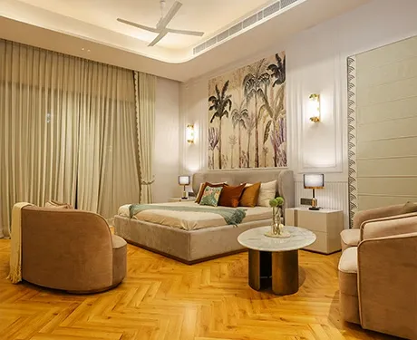Luxurious bedroom with cozy seating and warm lighting decor