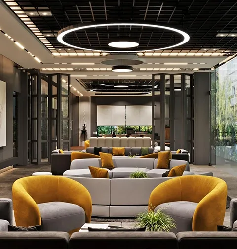 Modern office lounge with circular lights and plush sofa seating area