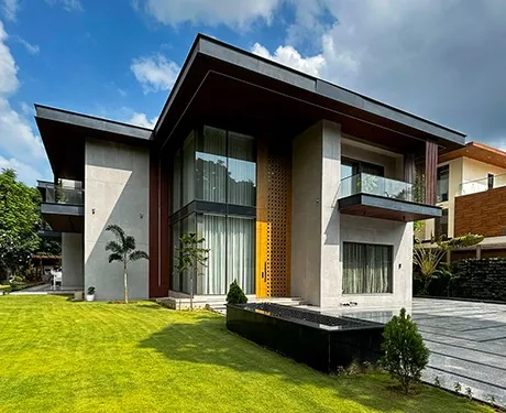 Modern luxury villa with sleek architecture and gardens